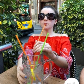 Glamorous daughter drinking