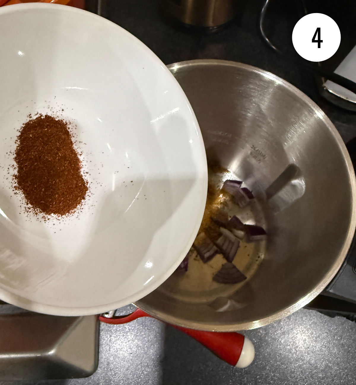 Adding spices and chilli powder to a soup maker